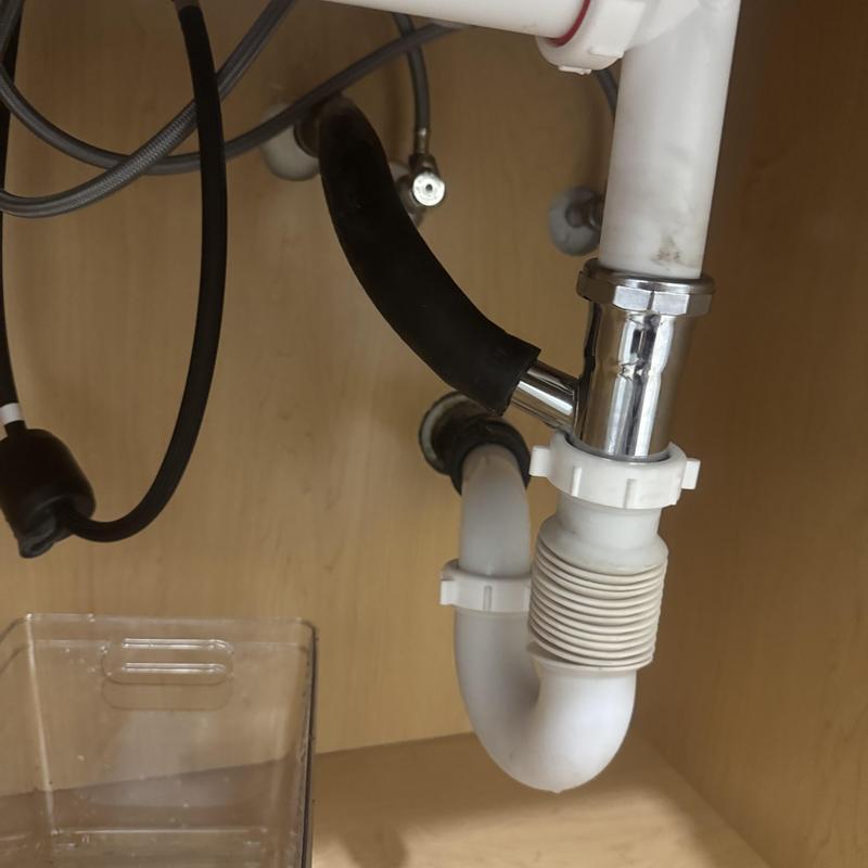 AC condensation line reattached under sink plumbing AC condensation line reattached under sink plumbing