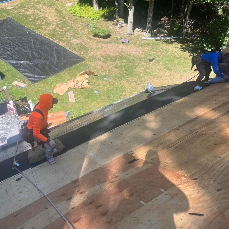 Roof decking installation on residential roof slope
