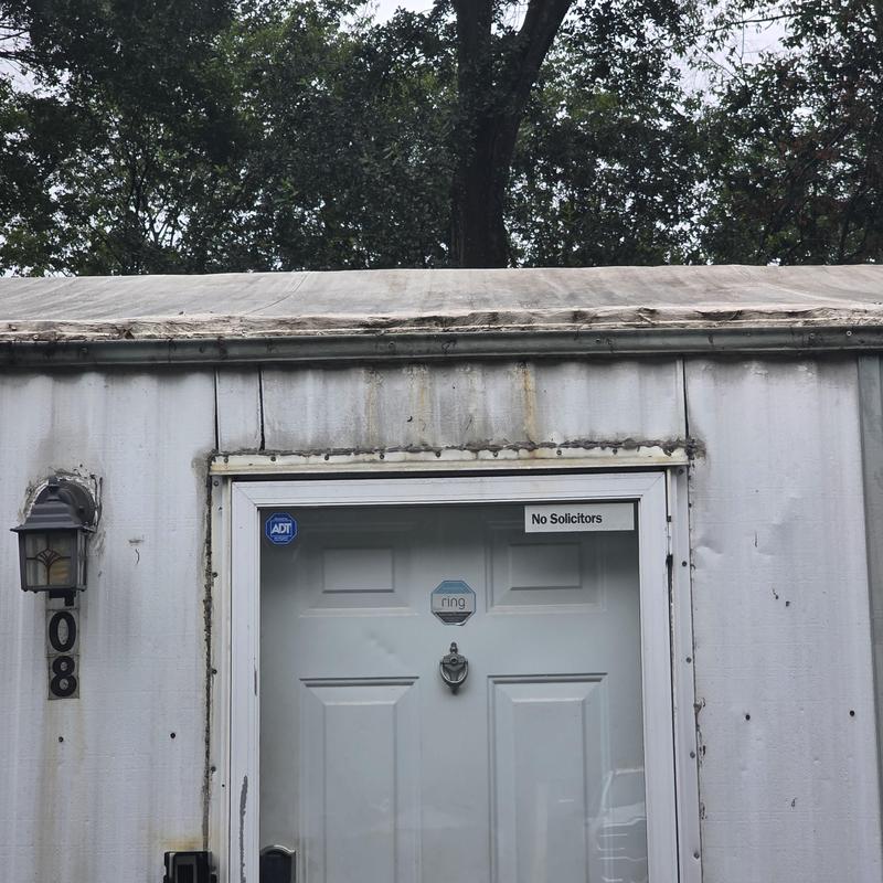 Gutter system and door frame water damage on mobile home