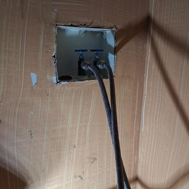 Washer box valves with water hoses in wall cavity