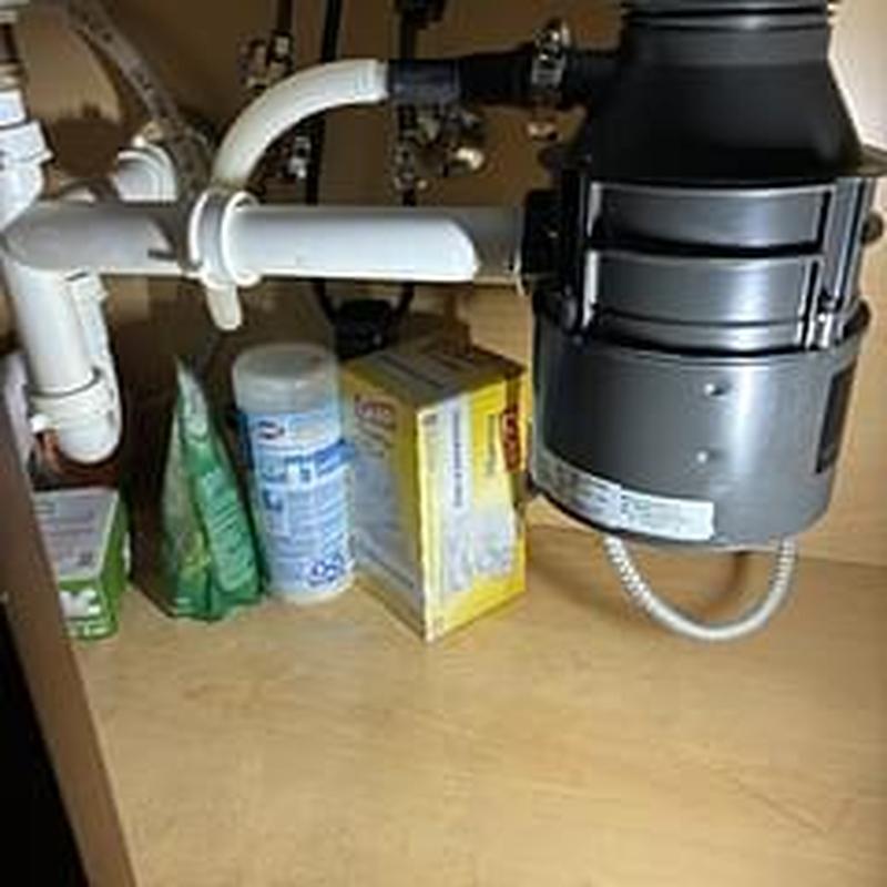 Badger 5 garbage disposer and drain pipes under sink