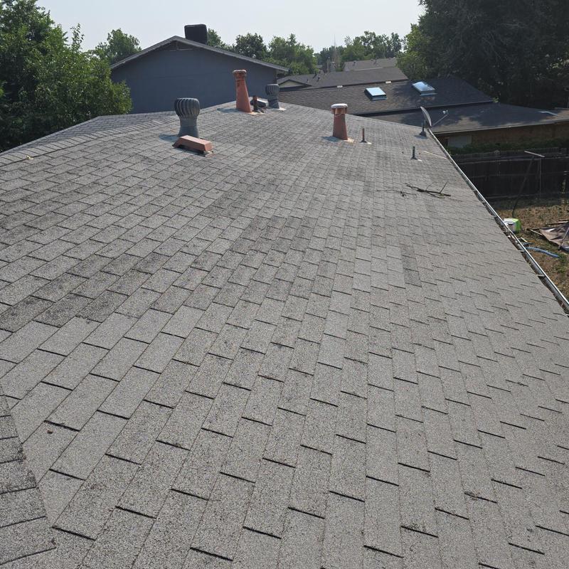 Asphalt shingle roof with minor wind and hail damage Asphalt shingle roof with minor wind and hail damage