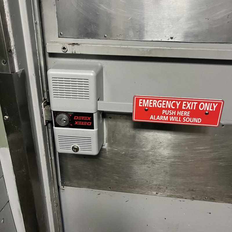 Detex 230D emergency exit alarm on metal door