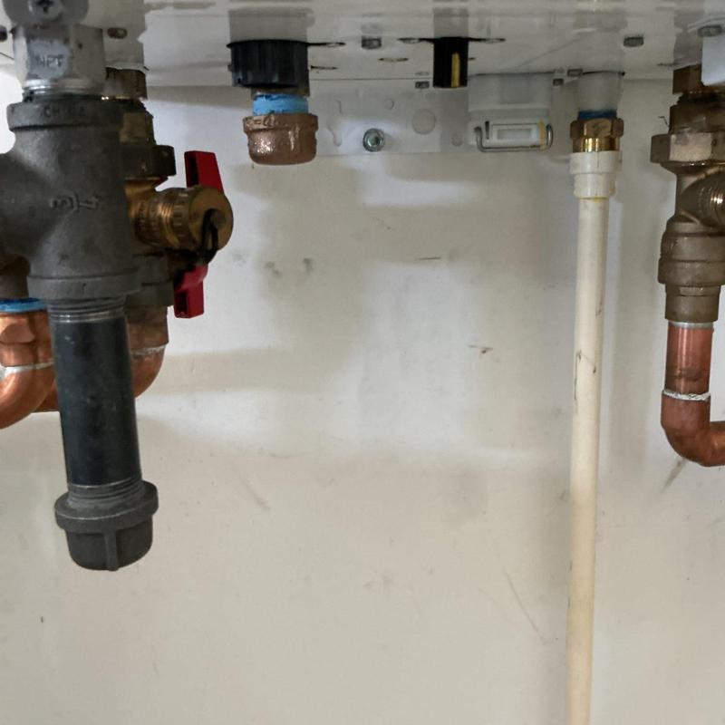 12-inch recirculation line capped under sink plumbing