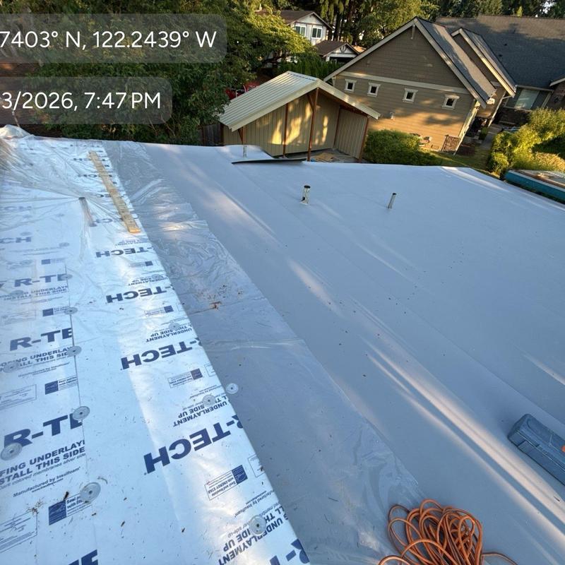 Roof underlayment installation on flat roof in Kenmore Roof underlayment installation on flat roof in Kenmore