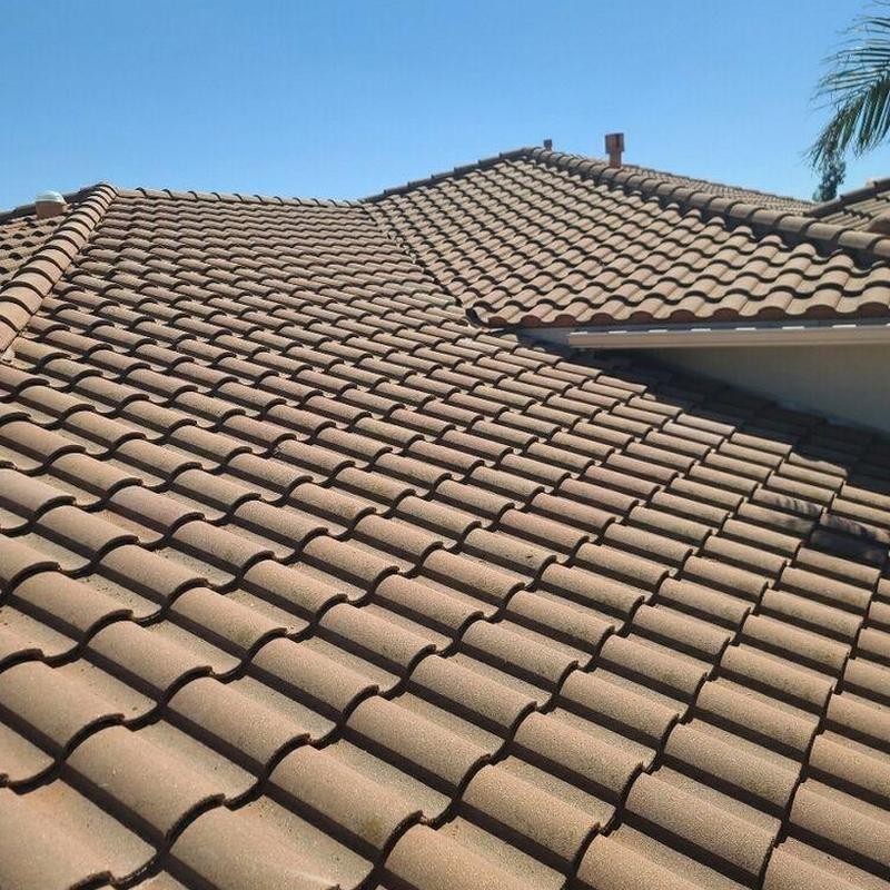 Tile roofing installation on residential apartment roof Tile roofing installation on residential apartment roof