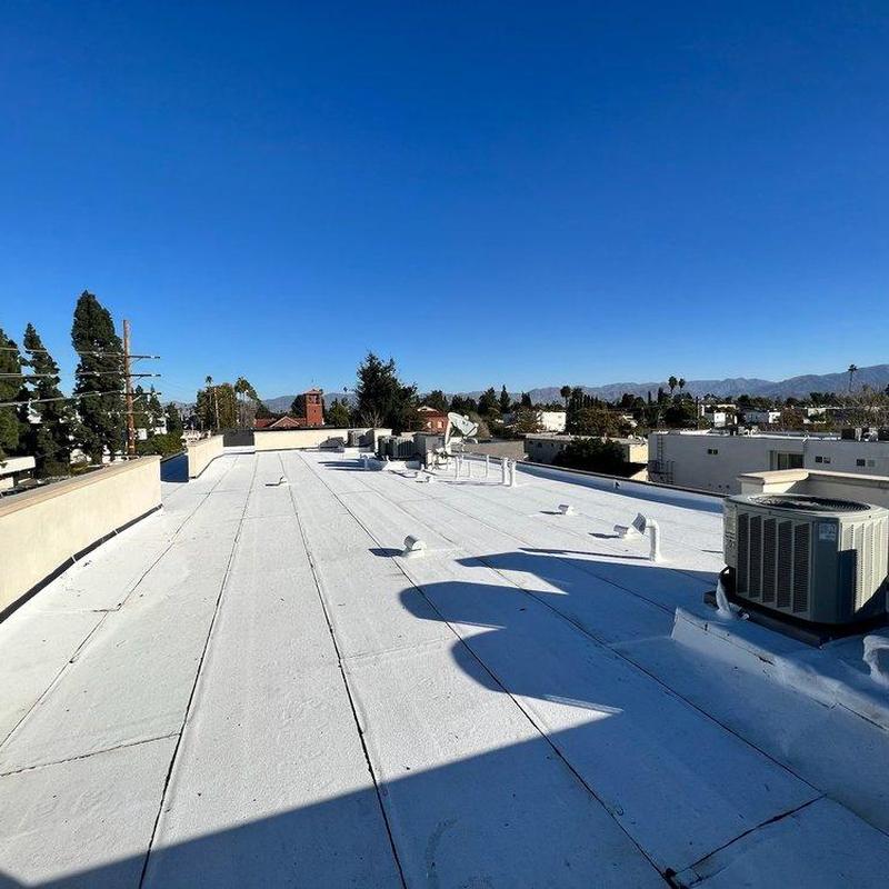 Commercial TPO roofing system with HVAC units on roof Commercial TPO roofing system with HVAC units on roof
