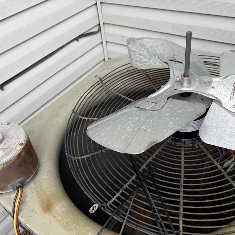 Condenser fan motor and blades on HVAC unit