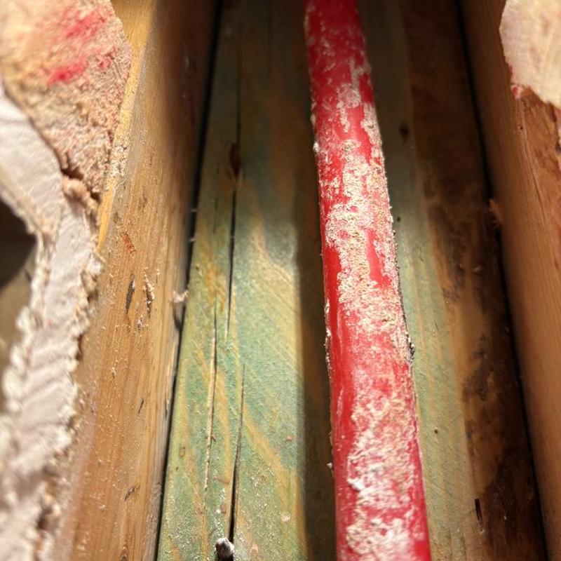 PEX hot water pipe installation in wall cavity PEX hot water pipe installation in wall cavity