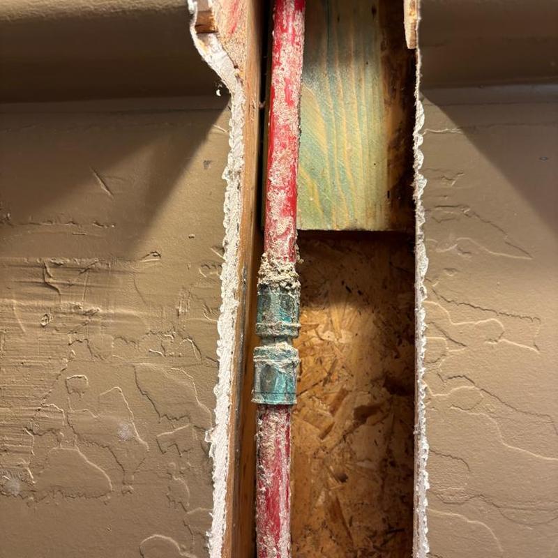 Hot water line with new copper pipe in wall cavity Hot water line with new copper pipe in wall cavity