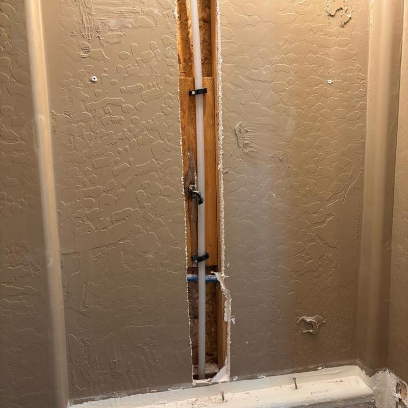 Hot water line with new copper pipe in wall cavity Hot water line with new copper pipe in wall cavity
