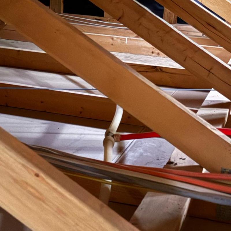 PEX tee leak repair in attic plumbing system PEX tee leak repair in attic plumbing system