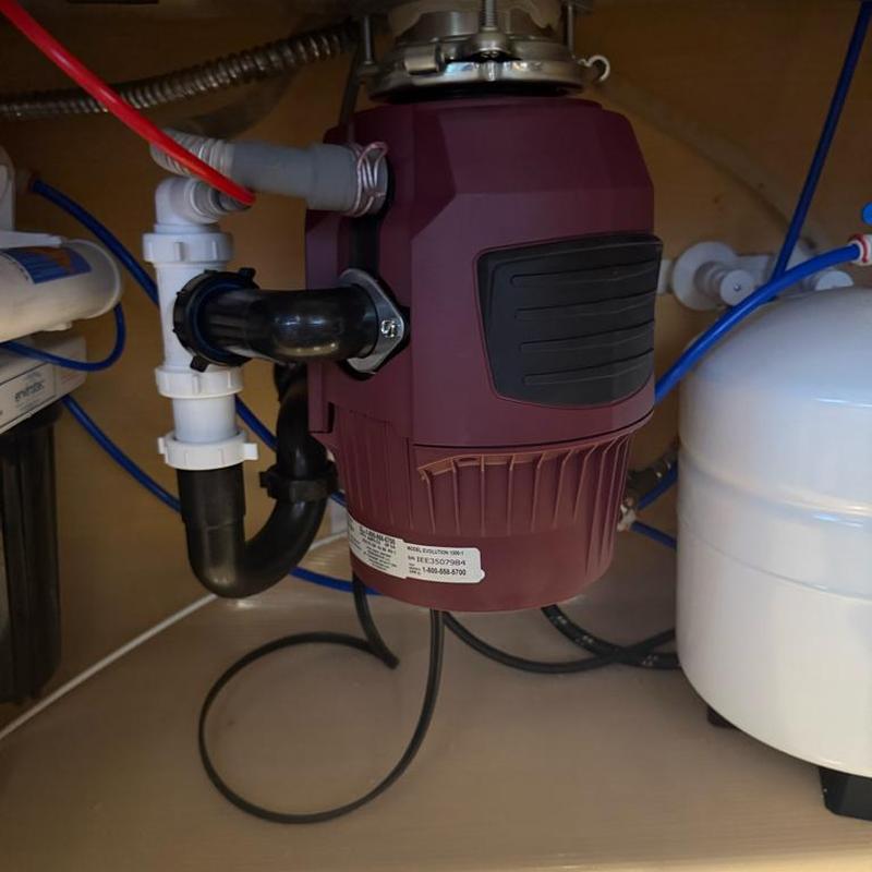 Garbage disposal installation under kitchen sink Garbage disposal installation under kitchen sink