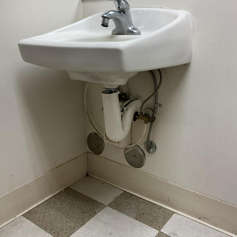 Sink drain pipe replacement under wall-mounted basin