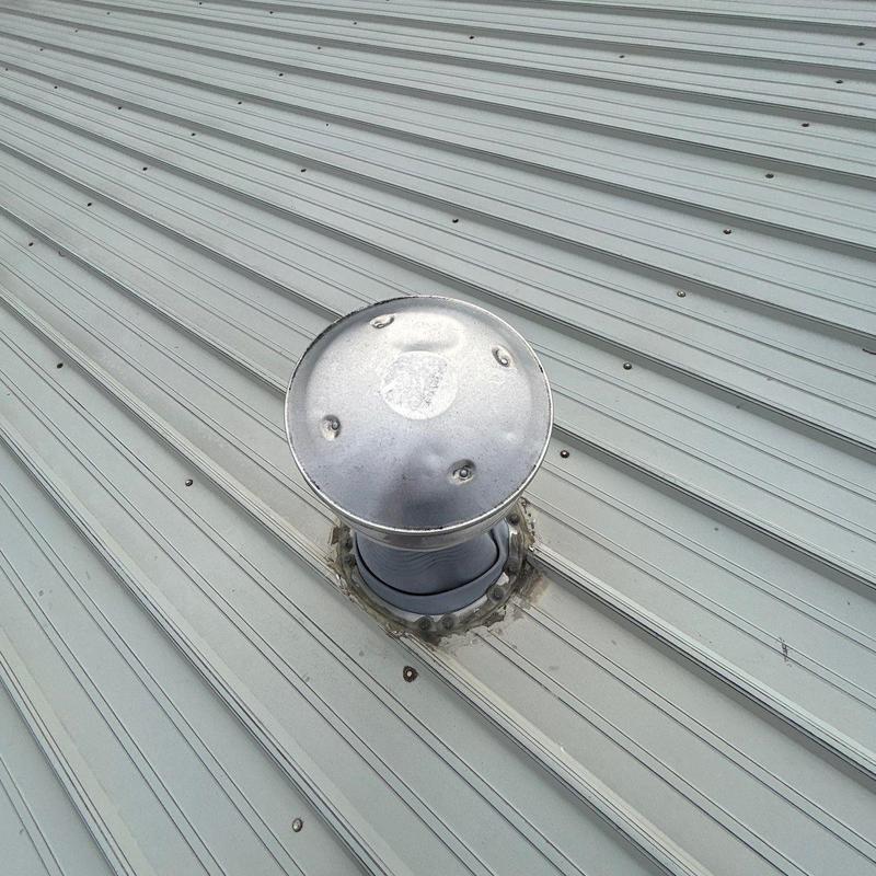 Metal roof vent pipe with sealant and screws