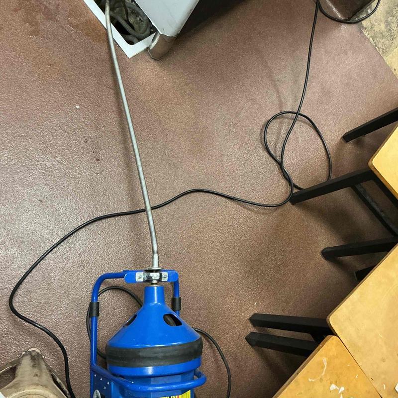 Floor drain clog removal with plumbing cable tool