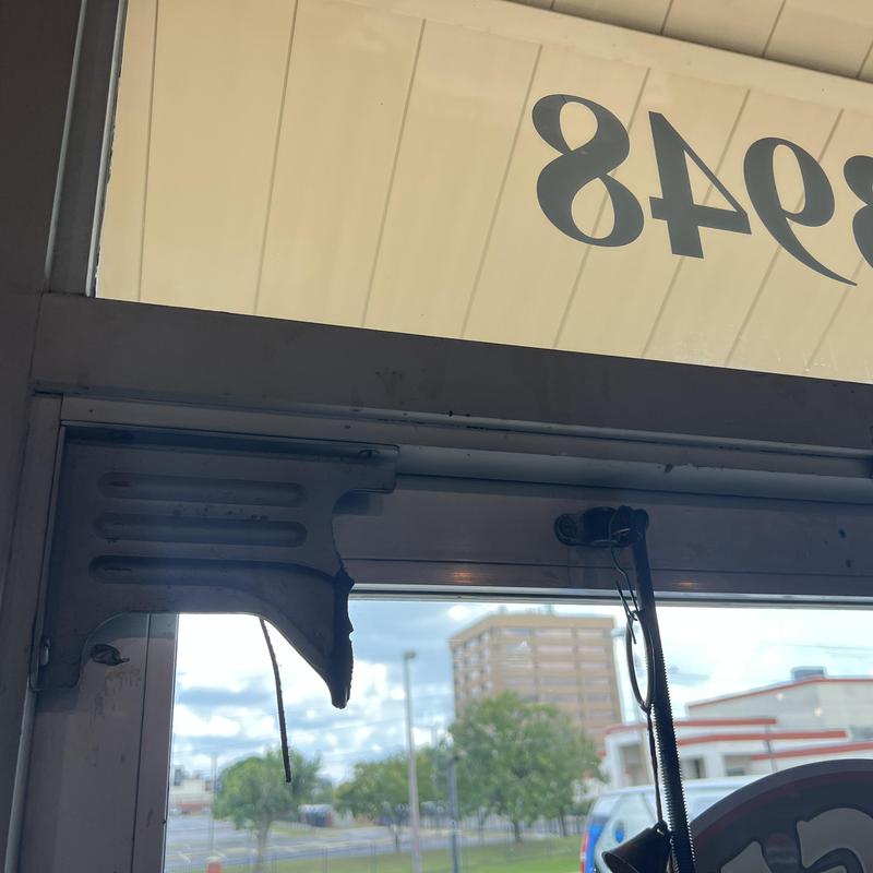 Door closer replacement with new metal closer arm