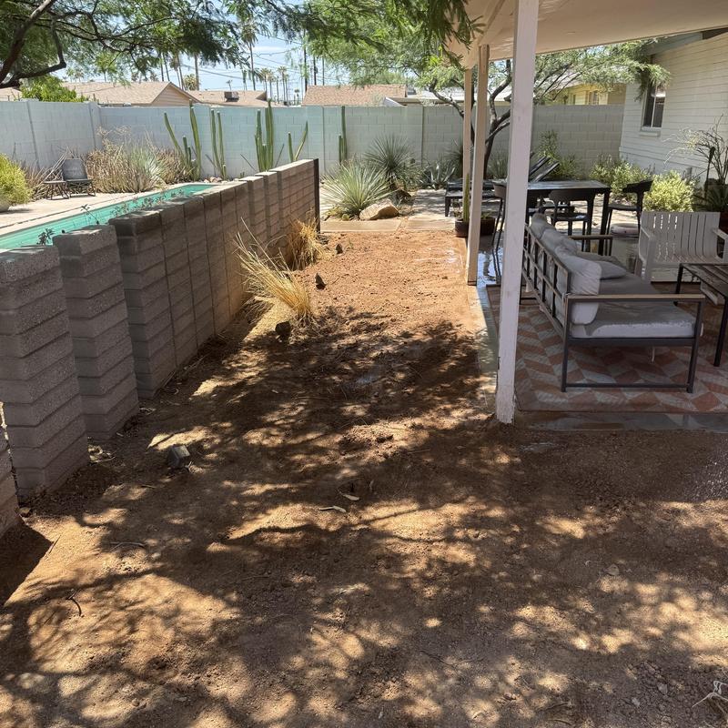 Laundry sewer line reroute in backyard with patio furniture Laundry sewer line reroute in backyard with patio furniture
