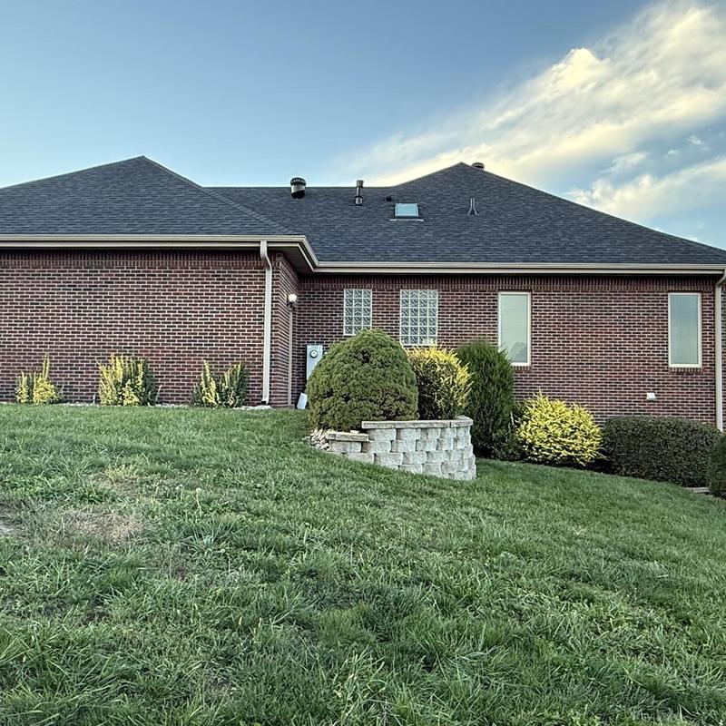Owens Corning impact resistant roof shingles on brick home Owens Corning impact resistant roof shingles on brick home