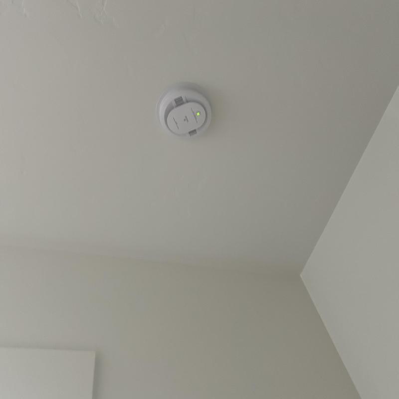Smoke detector installed on white ceiling in Meridian Idaho