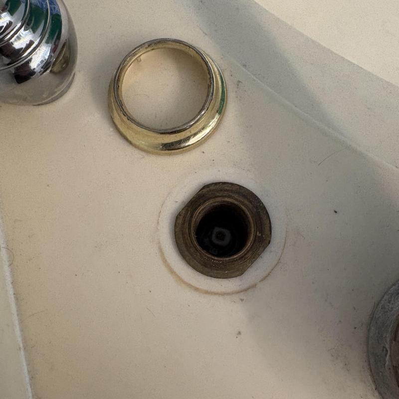 Faucet cartridge housing with removed trim ring