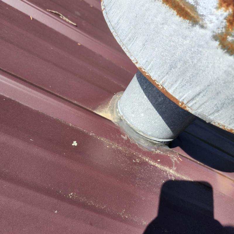 Metal roof vent flashing with rust and sealant issues