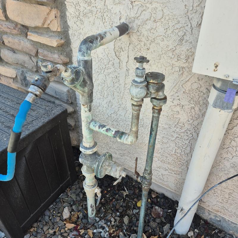 Pressure regulator valve and outdoor hose bib setup