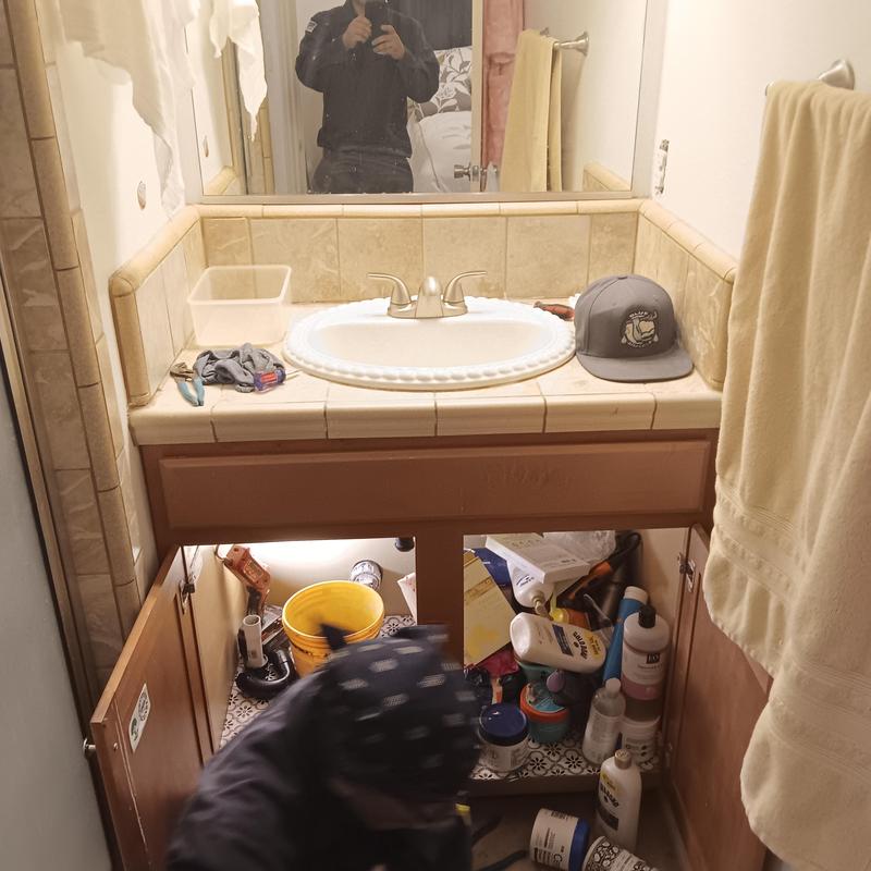 Bathroom sink faucet and cabinet plumbing installation
