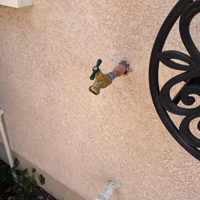 Hose bib with soldered threaded adapter on wall