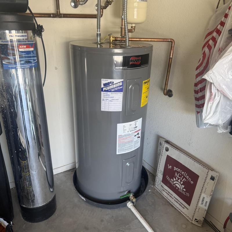 RUUD water heater with connected copper piping