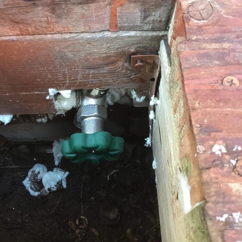 Anti-siphon hose bib installation with foam insulation