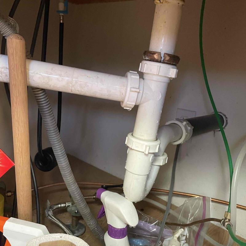 Kitchen sink drain pipes with leaking cracked SJ nut