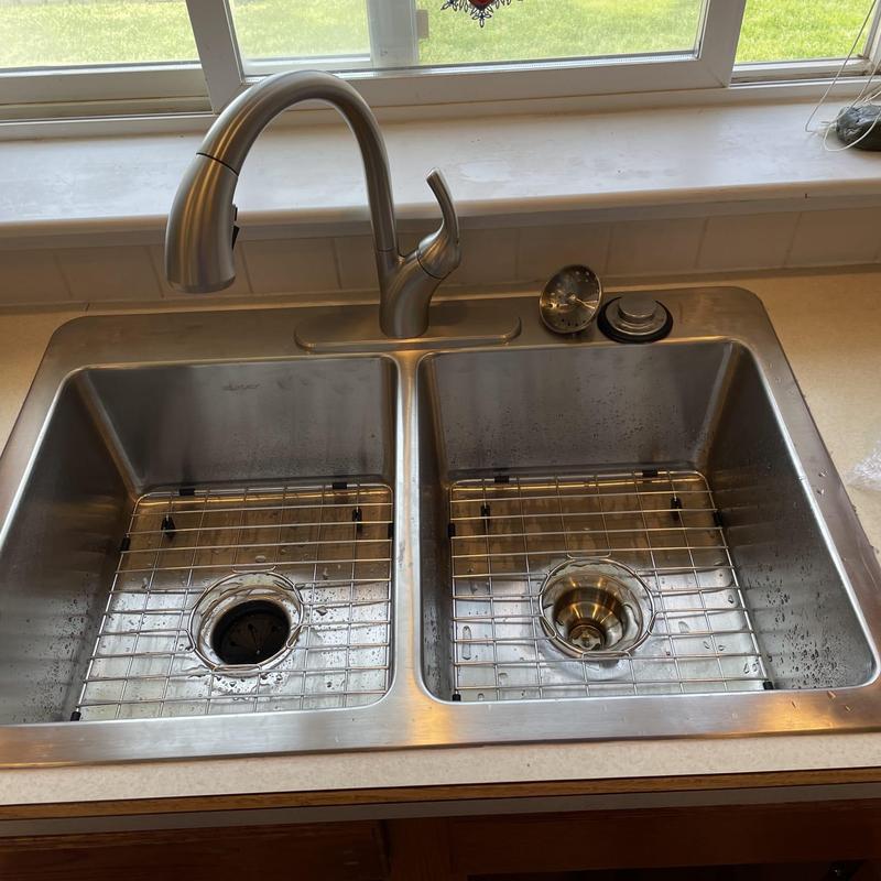 Kitchen sink and faucet with dual basin and drain guards