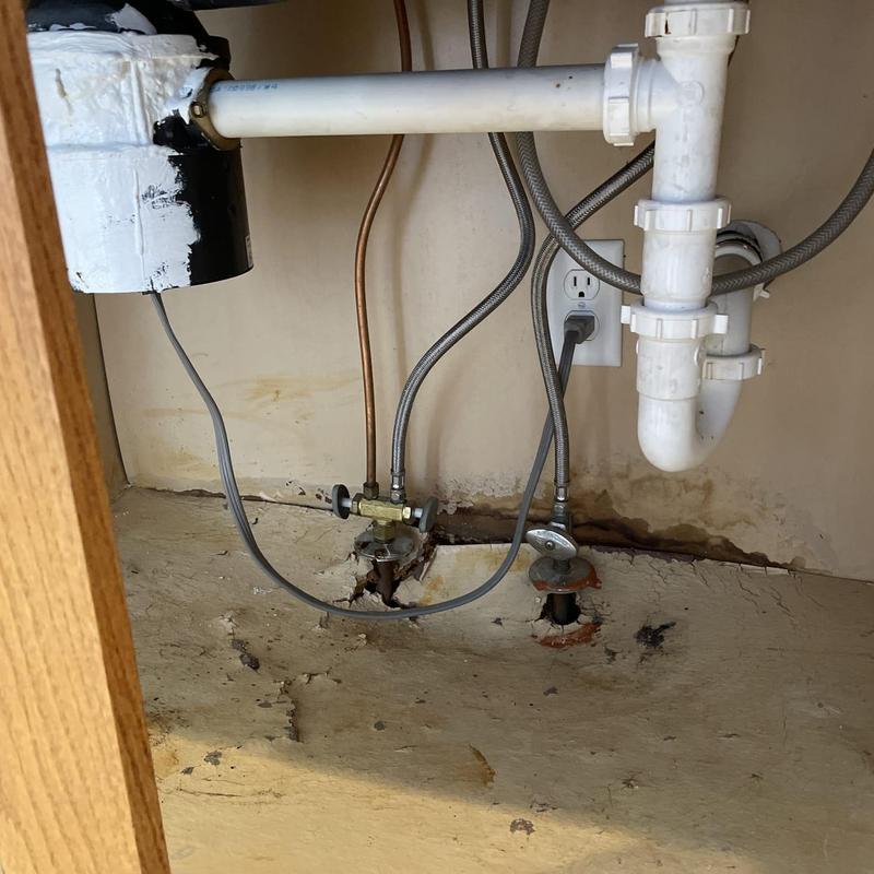 Kitchen sink plumbing with angle stops and disposal hookup