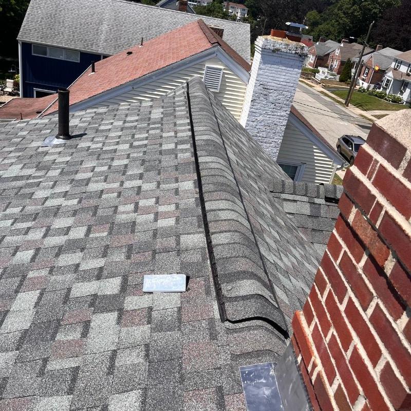 Asphalt shingle roof with ridge vent in New London, CT