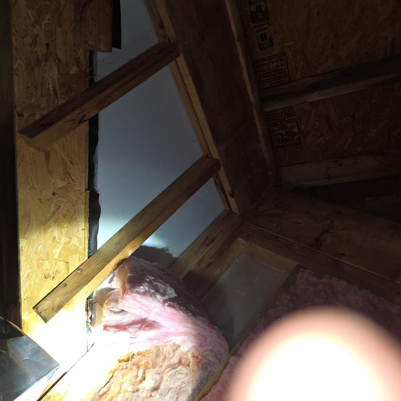 Roof wood framing and insulation with water damage