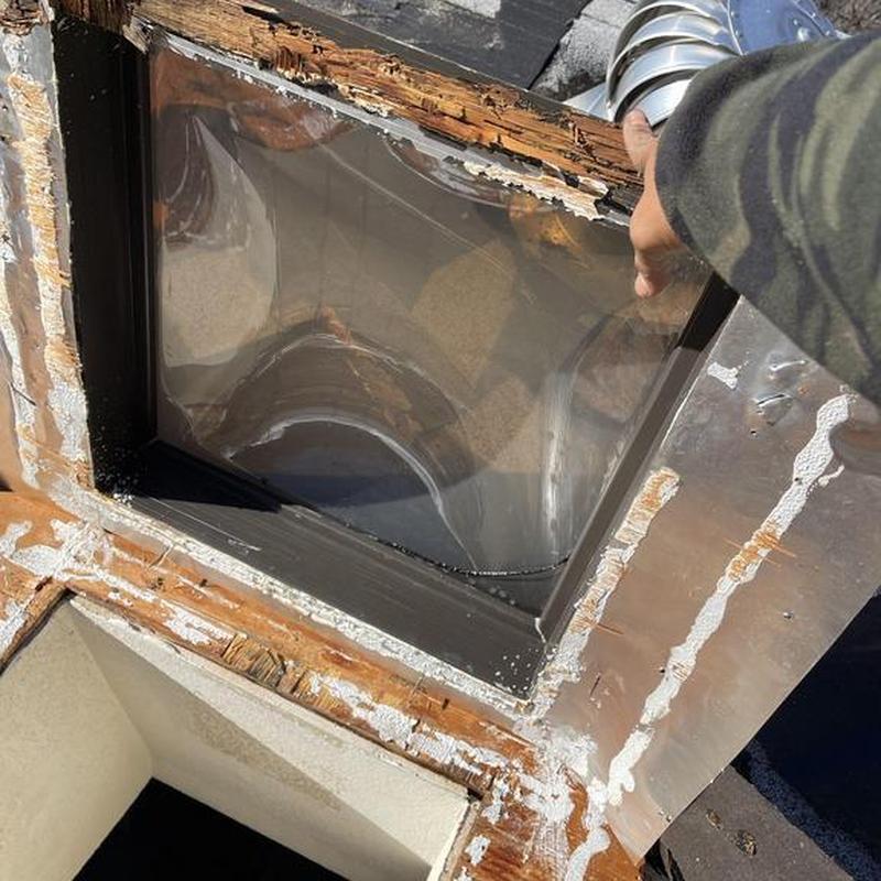 Velux skylight frame with wood rot and flashing repair