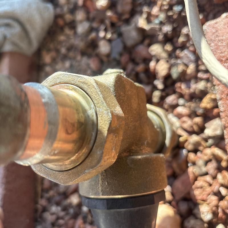 Brass backflow prevention valve with copper pipes