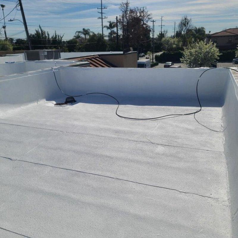 Flat roof membrane installation on residential building Flat roof membrane installation on residential building