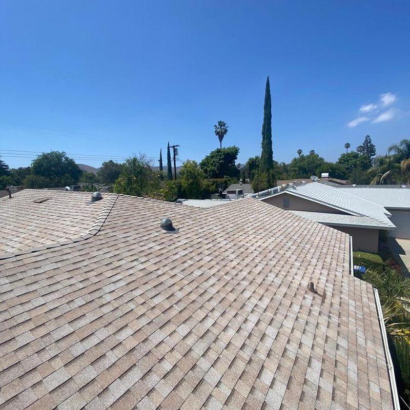 Shingle roof with proper alignment and ventilation vents Shingle roof with proper alignment and ventilation vents