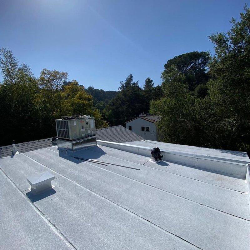 Flat roof with HVAC unit and ventilator installed Flat roof with HVAC unit and ventilator installed