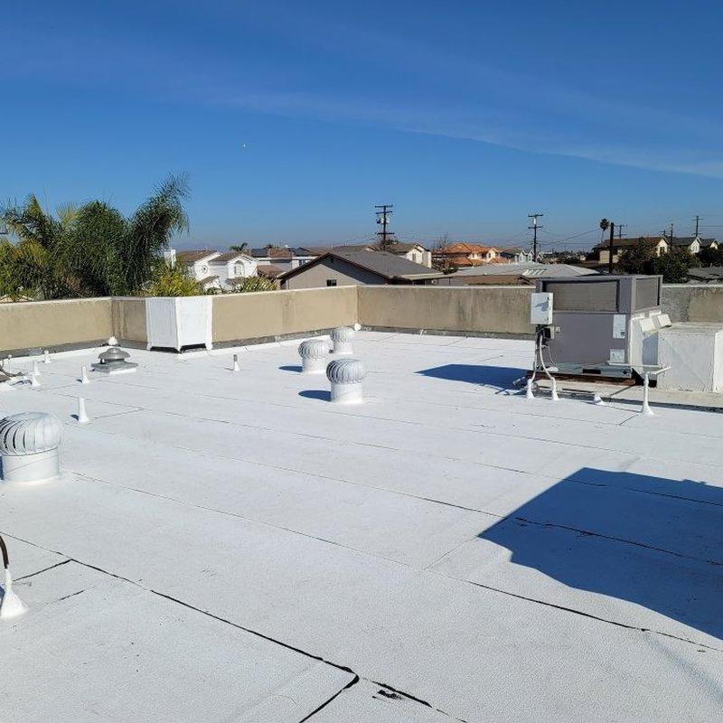 Commercial flat roof with ventilation and HVAC unit Commercial flat roof with ventilation and HVAC unit