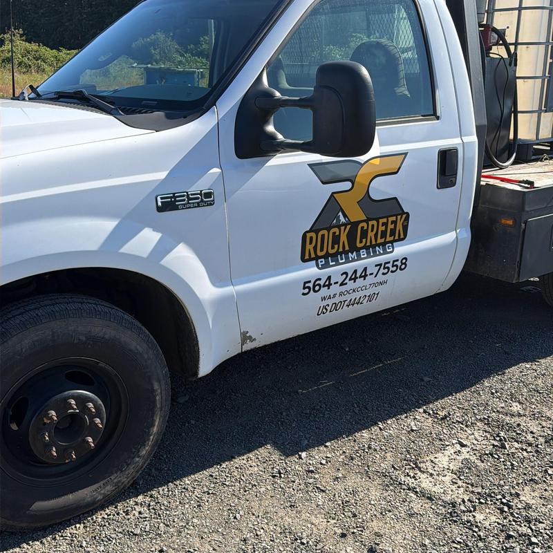 Kitchen drain cleaning truck with Rock Creek Plumbing logo Kitchen drain cleaning truck with Rock Creek Plumbing logo