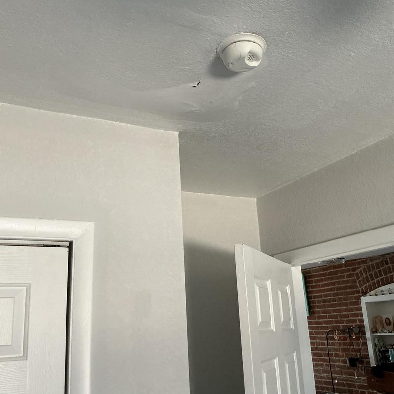 Ceiling water damage from tub shoe leak upstairs