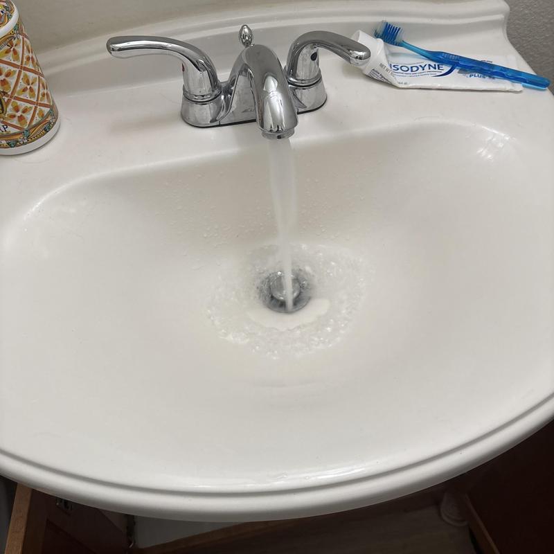 Bathroom sink faucet with running water