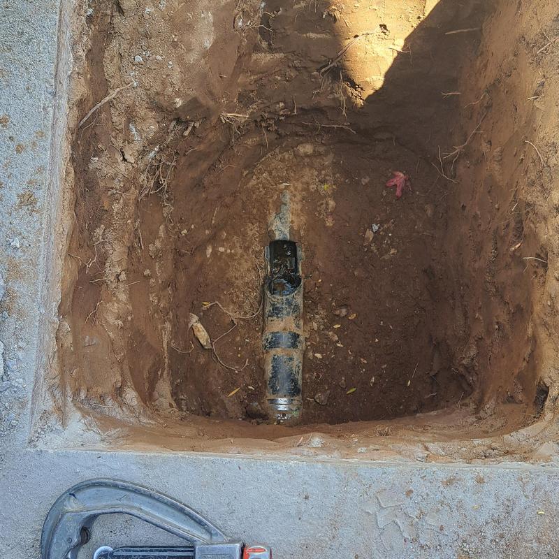 Sewer line section in excavated soil trench Sewer line section in excavated soil trench