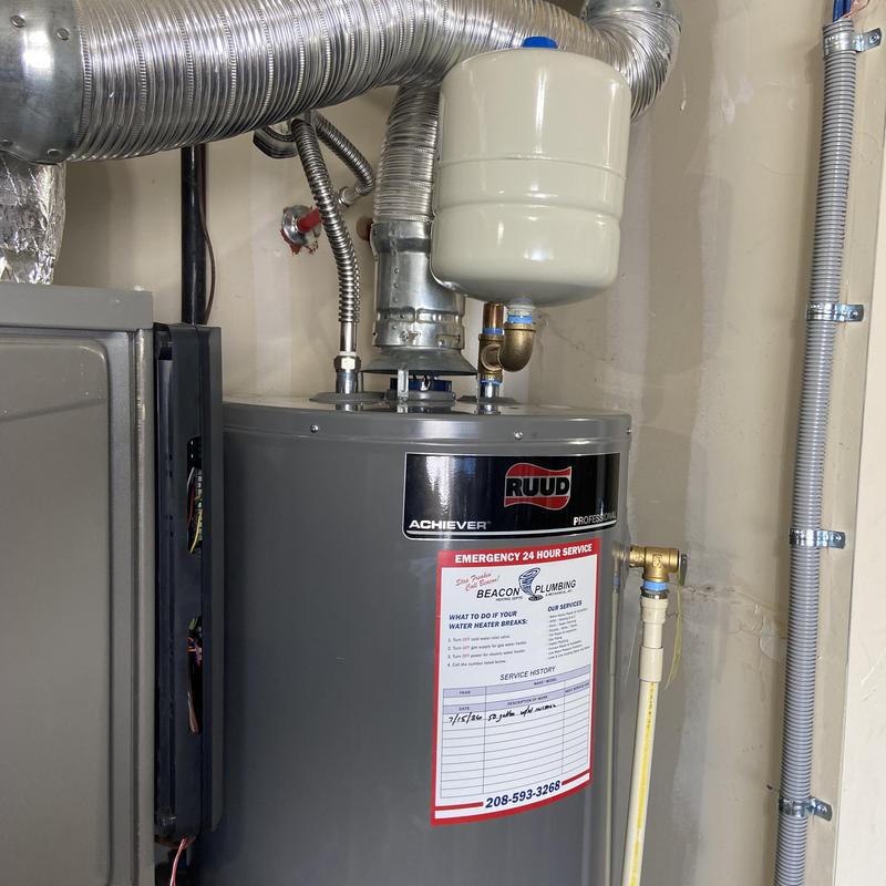 Water heater replacement with expansion tank and venting