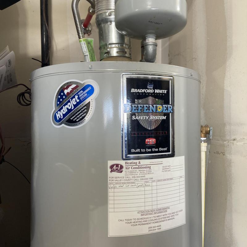 Water heater with Bradford White Defender system