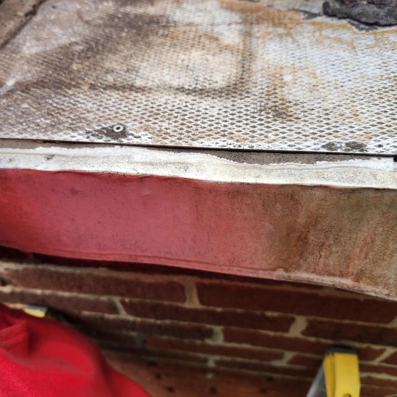 Chimney flashing with rust and corrosion buildup
