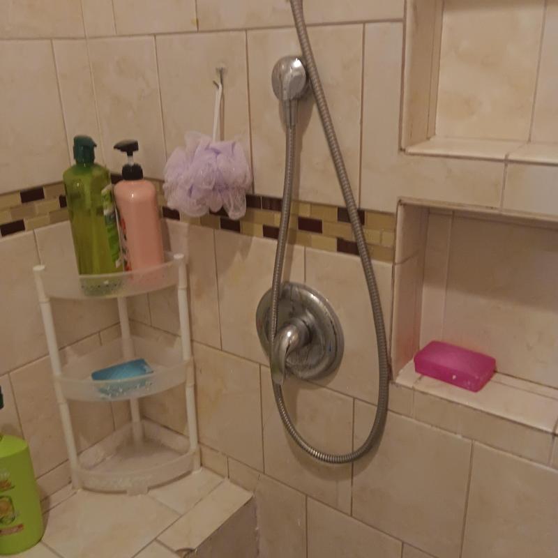 Single handle Moen shower valve with hose installation